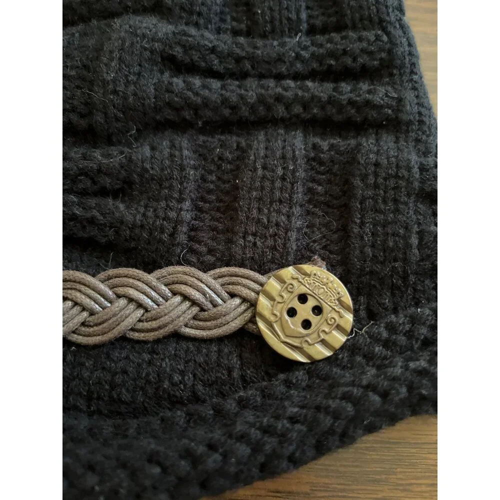 Black beenie toboggan hat with brown beading and buttons in front